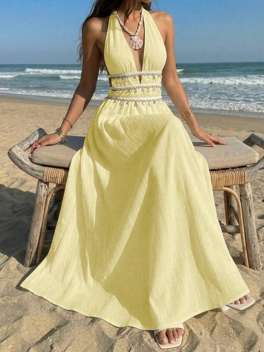 Vestido Saída de Praia Longo Halter Sol da Enseada com Nó e Bainha Plissada — fotografia 15 | Mar & Pérola