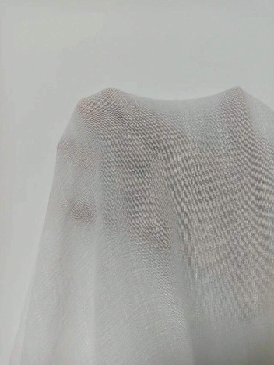 Vestido Saída de Praia Longo Halter Trama Solar em Crochê Vazado — fotografia 8 | Mar & Pérola